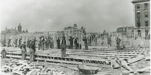 Workers on site of Sims Hall construction. Syracuse University Photograph Collection.