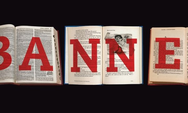 books open with letters BANNED spelled out in red above books