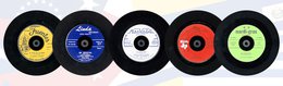 five 45 records with colorful labels