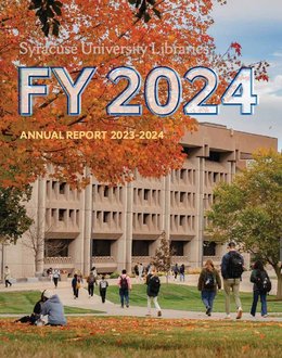 outside of Bird Library with fall orange leaves of trees in foreground, students walking