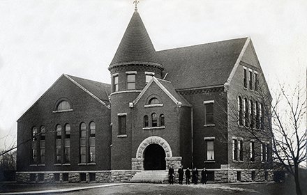 brick building with turret roof