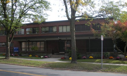 squat two story brick building