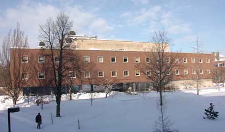 long three-story brick building