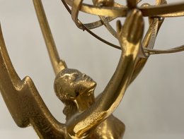 emmy's and description on display in case
