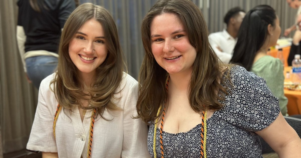 Natasha Brao and Kelly Davis pose for a photo