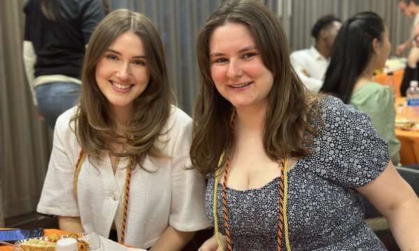 Natasha Brao and Kelly Davis pose for a photo