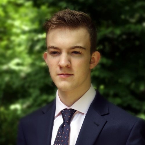 student in a jacket and tie