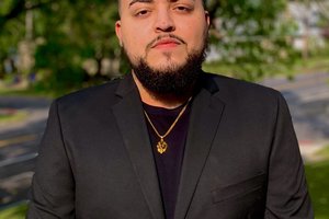 Jose Arrieta in suit pose for a photo