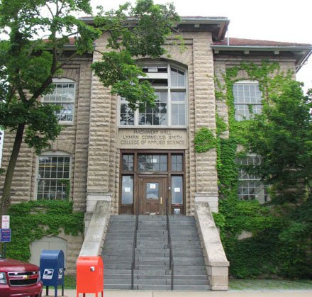 sandstone building with brown door