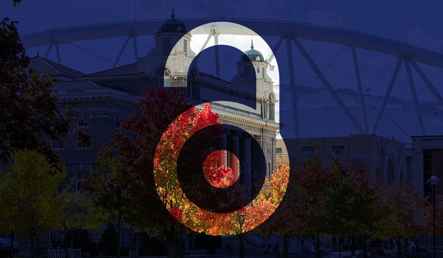 Blue overlaid image of Carnegie Library and Syracuse University stadium with transparent cutout of Open Access unlocked lock logo with fall foliage peeking through