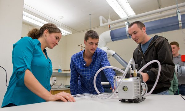 researchers in a lab