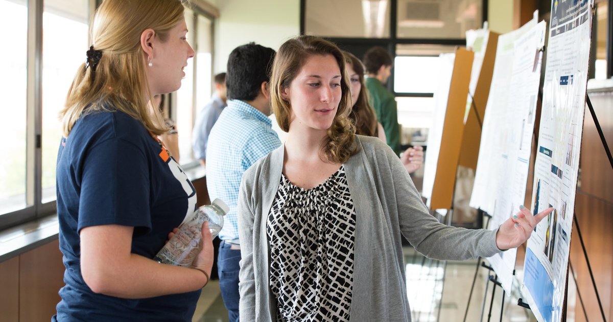 students presenting at poster session