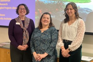 3 people standing in front of screen