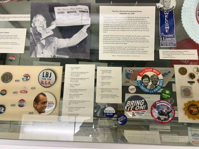 display case holding presidential memorabilia