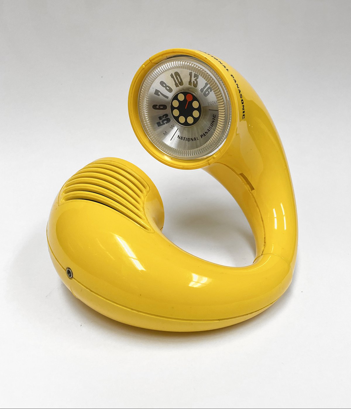 yellow circular telephone
