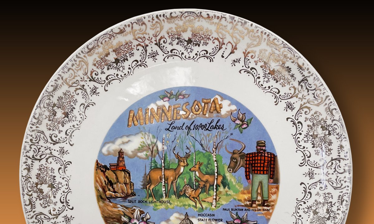 Minnesota plate with tagline "Land of 10,000 Lakes"