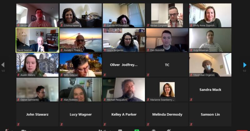 Screenshot of Zoom meeting virtual celebration with panels of faces