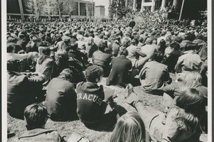 Photograph of students and campus community members gathered in front of Hendricks Chapel for the May 4 rally, 4 May 1970. Syracuse University Photograph Collection [https://library.syr.edu/digital/guides_sua/html/sua_photographs.htm], University Arc