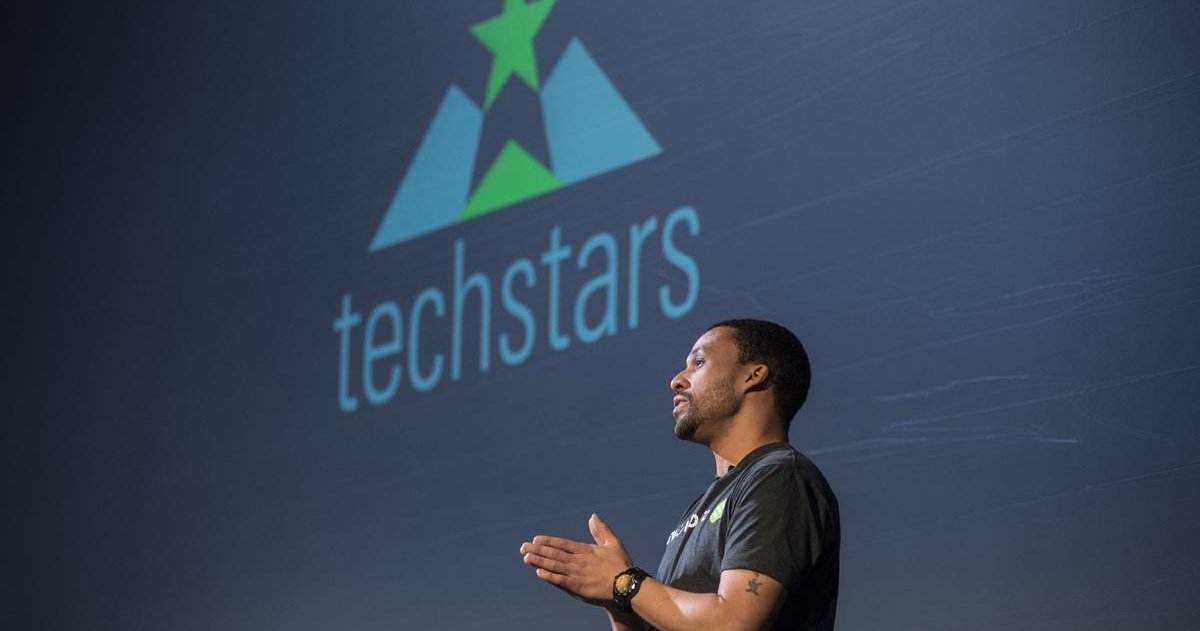 person speaking at demo day