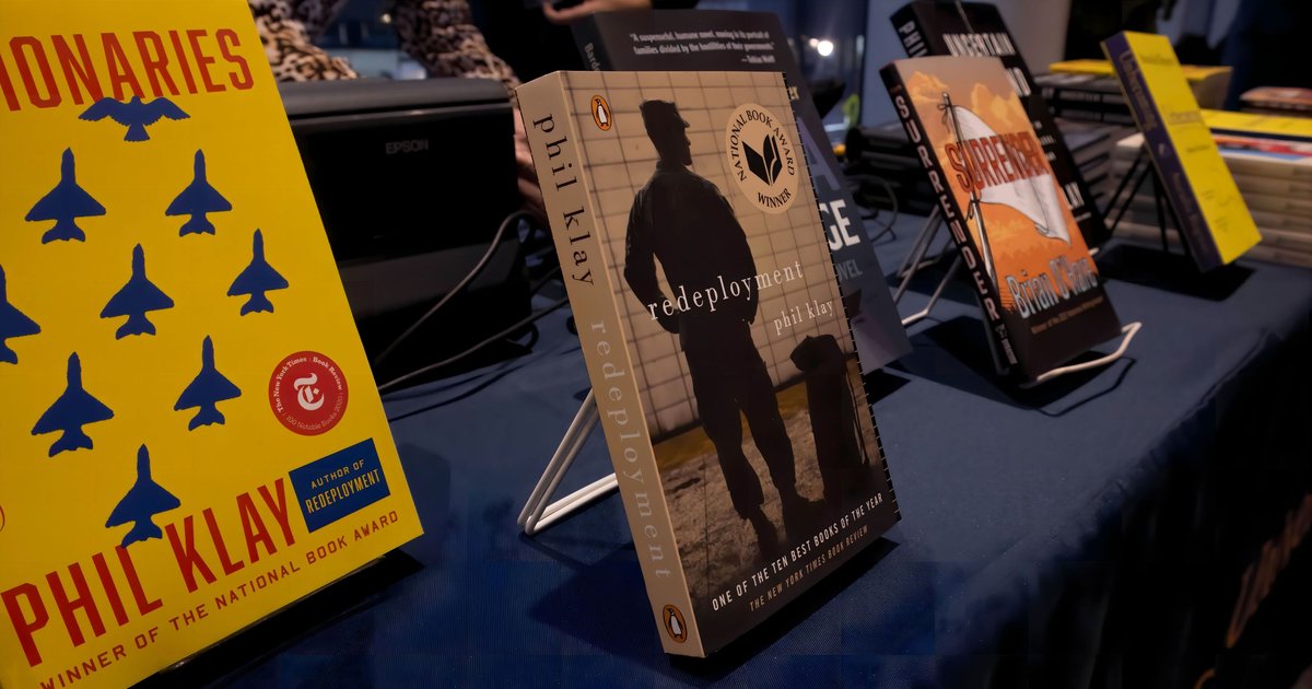 table with veteran author books on display