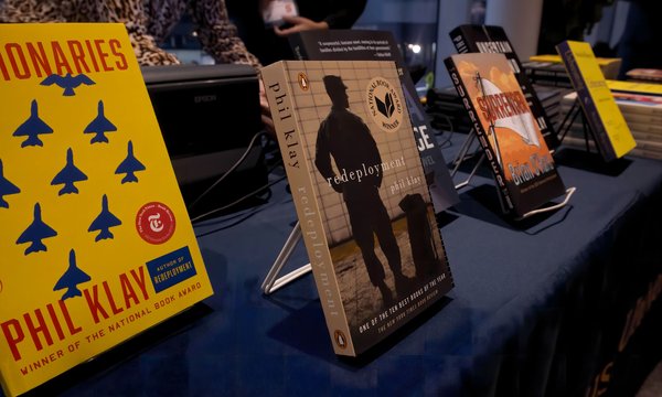 table with veteran author books on display