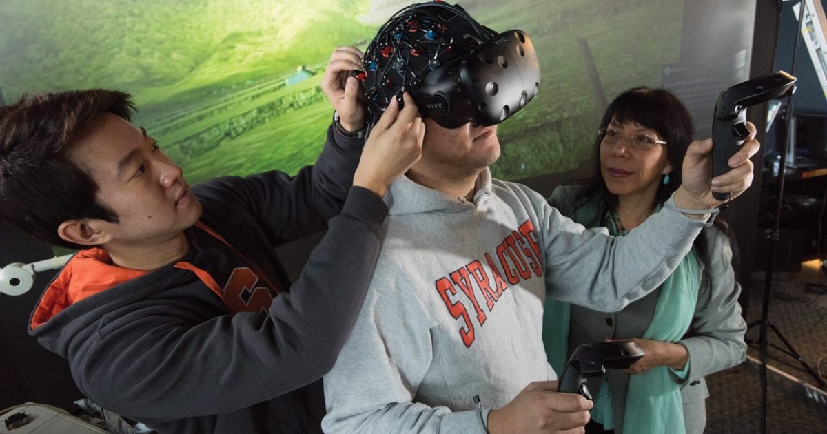 syracuse student using a virtual reality headset